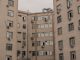 Immeuble résidentiel en copropriété à Toulouse avec unités extérieures de climatisation installées en façade